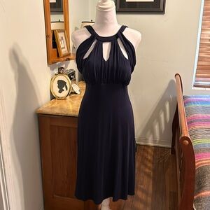 Only worn once Honey and Rosie navy, sleeveless dress with shelf bra.Size XL.